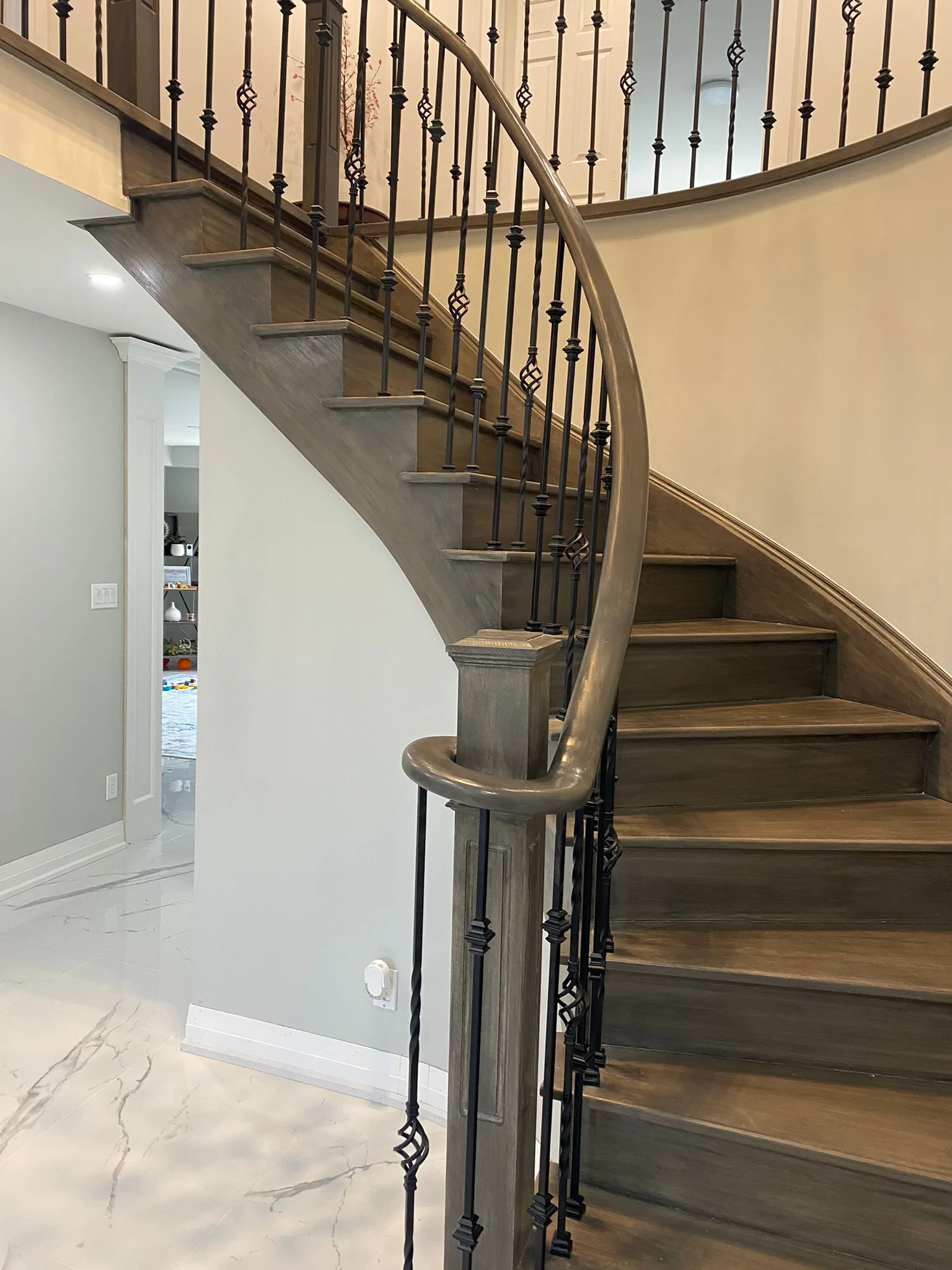 Renovated curved wooden staircase