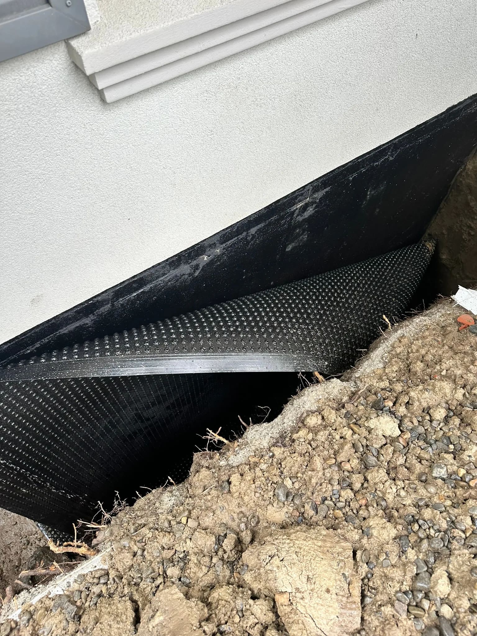 Exterior basement waterproofing membrane