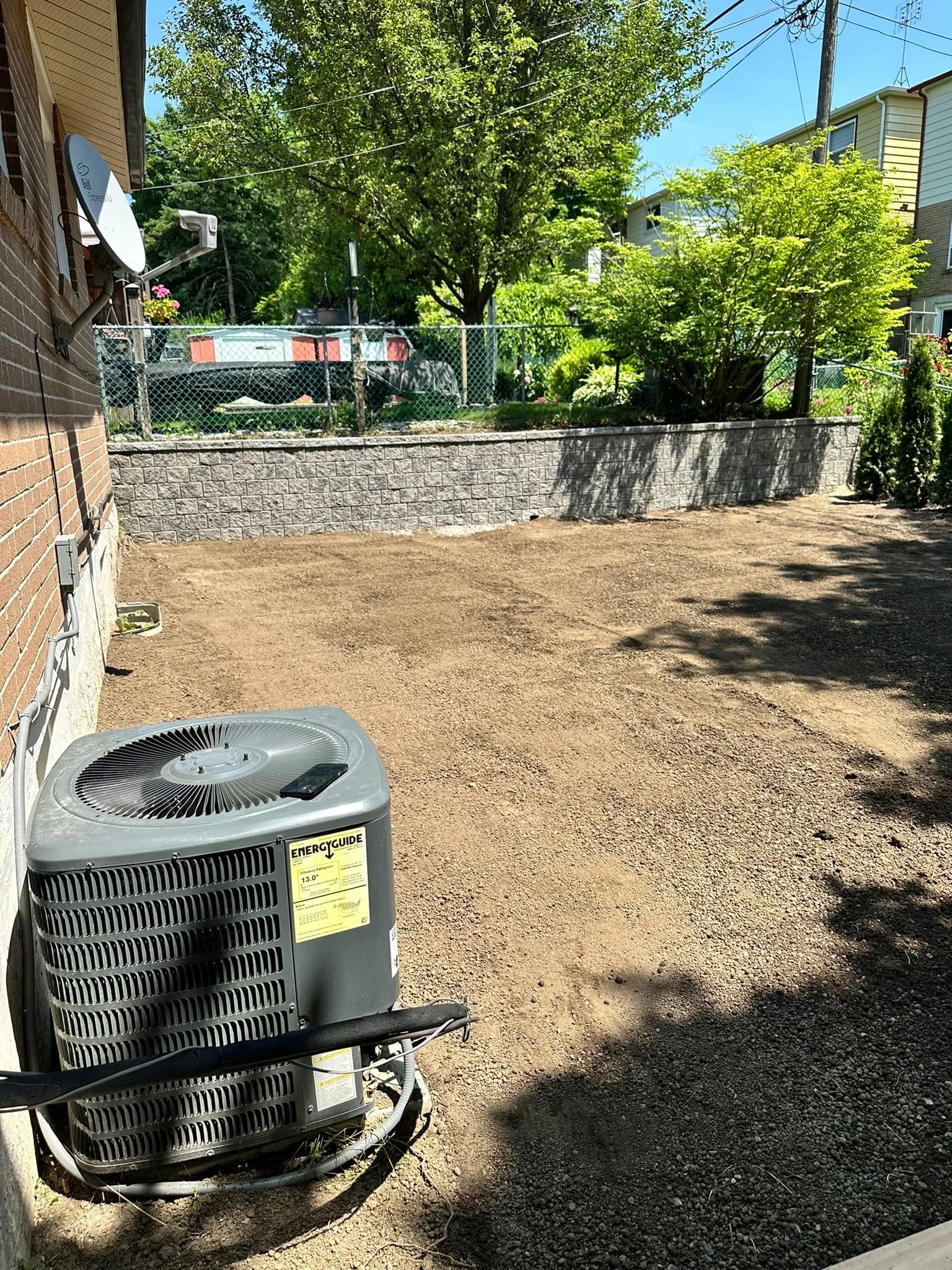 New retaining wall installed along the rear property line